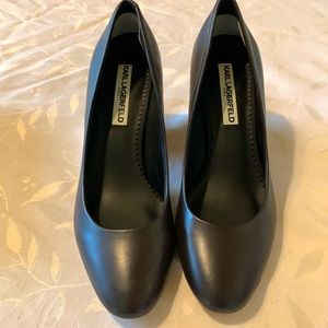 Dark brown Karl Lagerfeld pumps .